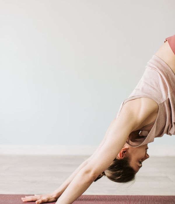Woman in a calm, focused pose, suggesting balance and inner peace.